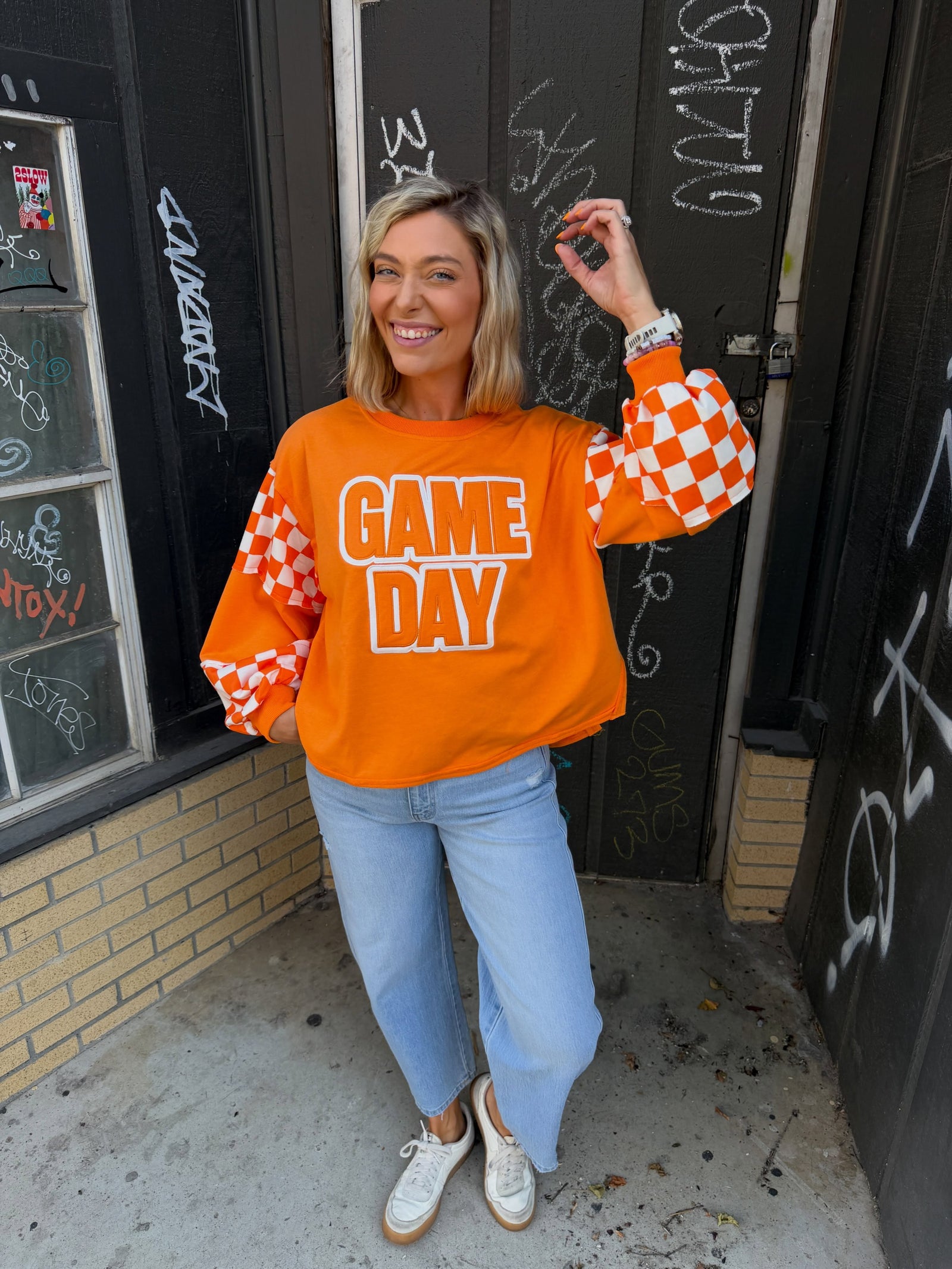 OYG orange game-day outfit styled for a big Saturday